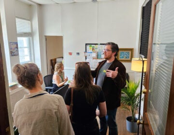 Ryan Keough leads a tour of the new mental health unit at Project HOME’s Helen Brown Community Center