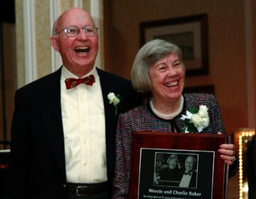 Charlie and Weezie accepting an awards