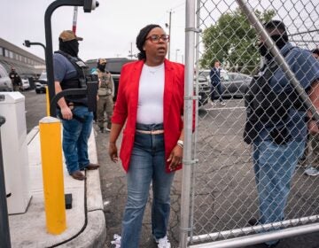 LaMonica McIver exits the grounds at Delaney Hall