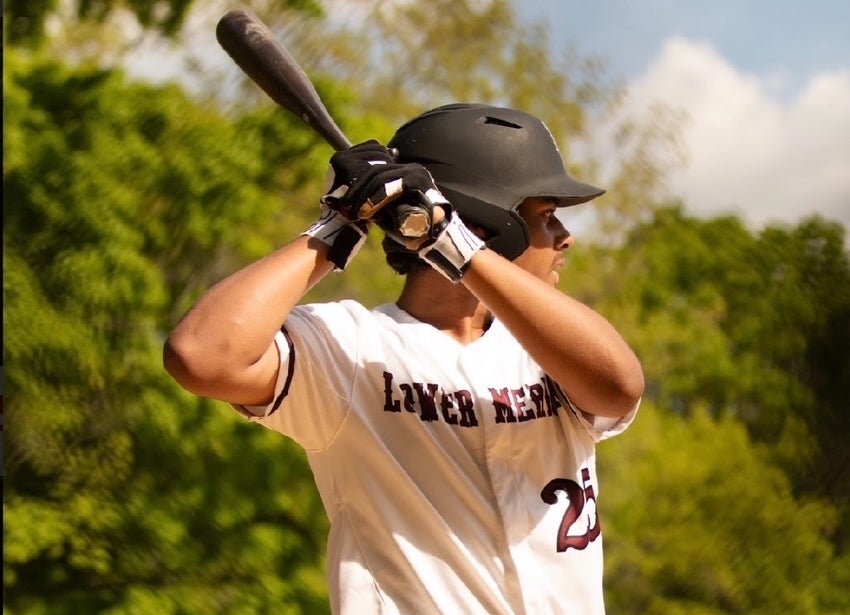 Meno Dwyer playing baseball