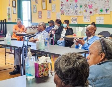 People at the Good Neighbor Senior Center listen to a presentation