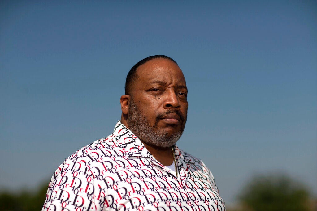 Gospel singer and pastor Marvin Sapp poses for a photo in front of a blue sky
