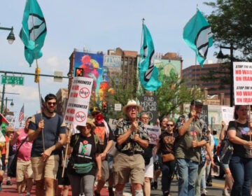People march in Philadelphia, calling for the U.S. to not become involved in the Israel-Iran war