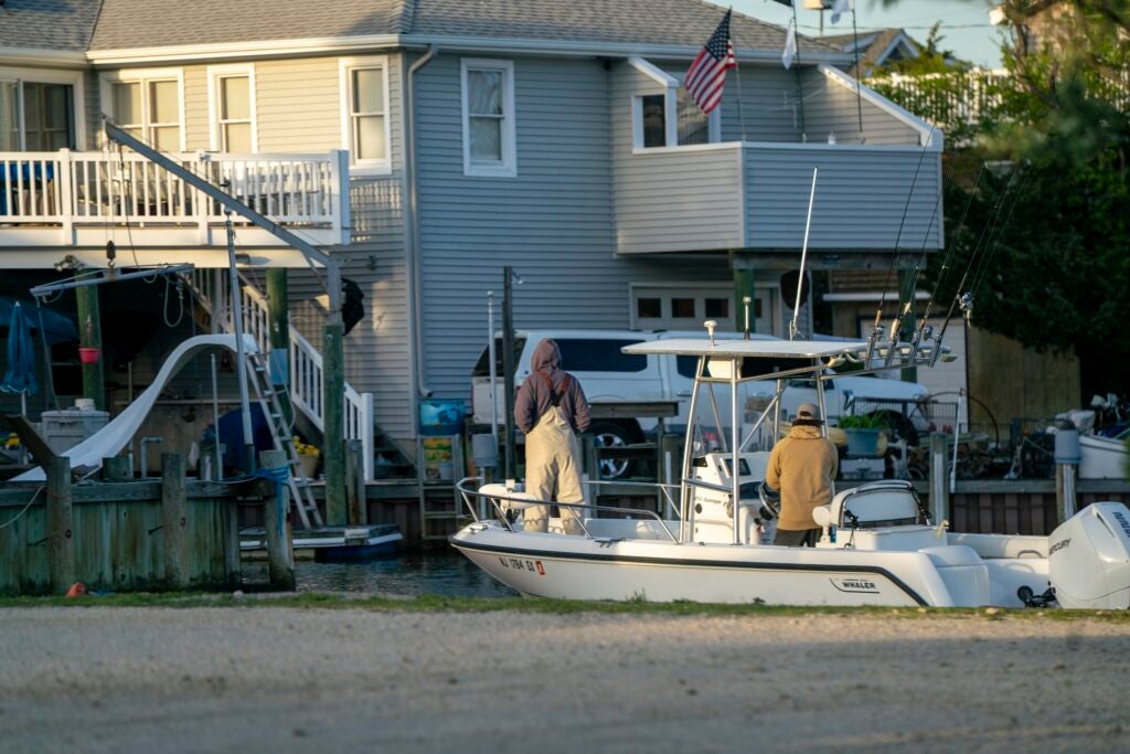 People on a boat after the flood