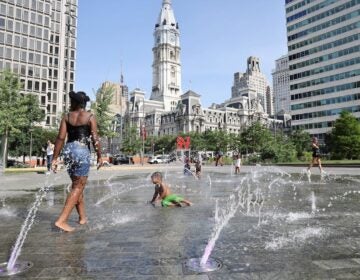 Children playing in fountain at Love Park