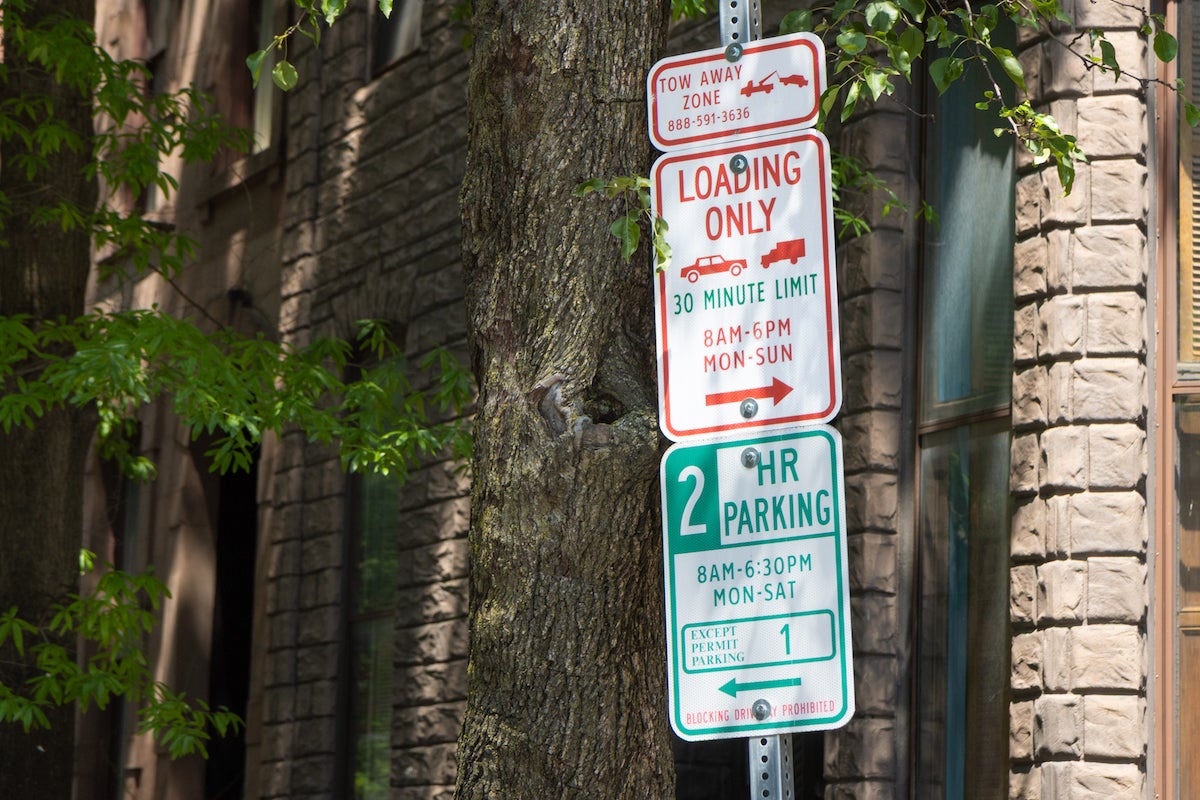 spruce-street-cc-loading-zones-KP-060425-01 Loading zone and parking zone signs in Philadelphia