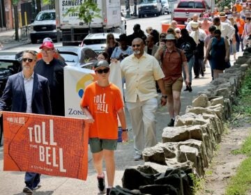 Christopher Gruits leads a march from the Annenberg Center to Philadelphia Episcopal Church