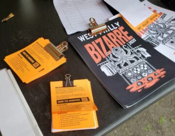 flyers for the West Philly Bizarre on a table
