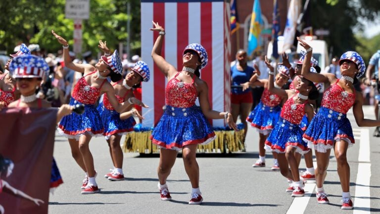 2025 07 04-e lee-philadelphia-4th of july parade dancers Women wearing American flag-themed dresses dance during the Philadelphia Fourth of July parade.
