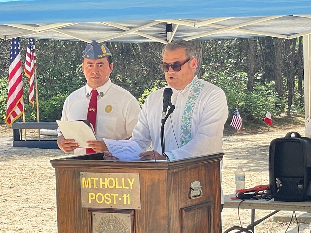 Head Consul Carlos Obrador of the Mexican Consulate based in Philadelphia gives remarks during the 98th annual memorial service for Mexican fighter pilot Emilio Carranza at a podium