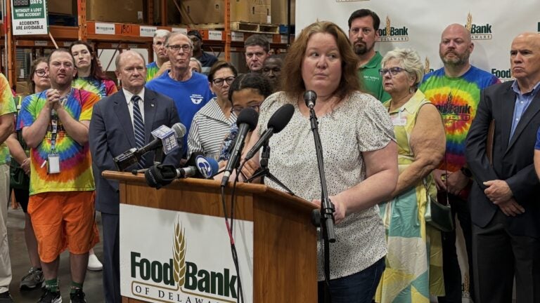 Elizabeth Morales speaking at a podium