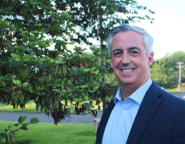 Bucks County Commissioner Bob Harvie poses for a photo outside