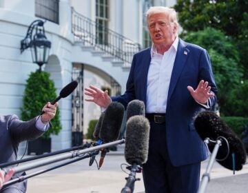 Donald Trump speaks to reporters