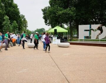 Visitors head into the Gateway Plaza section of FDR Park