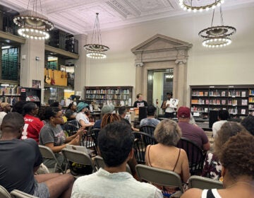 People gather for a vinyl club meeting in one of Philadelphia's libraries