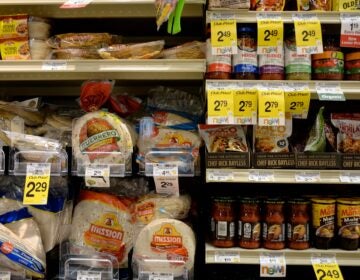 Tortillas and other items on a store shelf