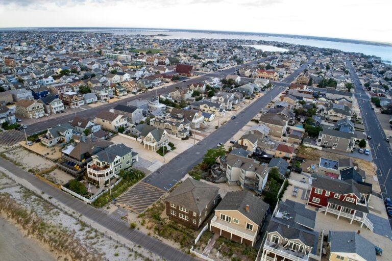 New Jersey shore Town looking west from Atlantic Ocean beach aerial view of a beach town