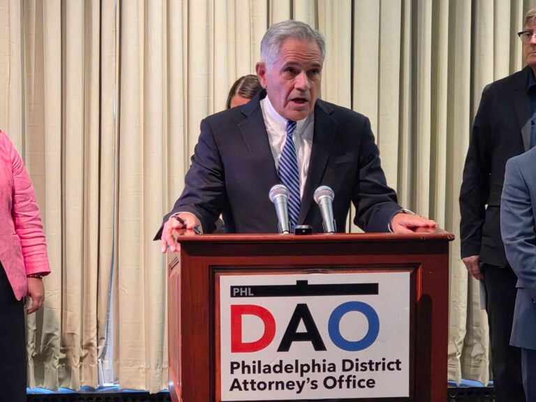 krasner-t-macdonald-2025-07-23 Larry Krasner speaking at a podium