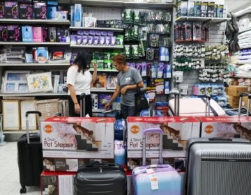People shop at a Manhattan retail store