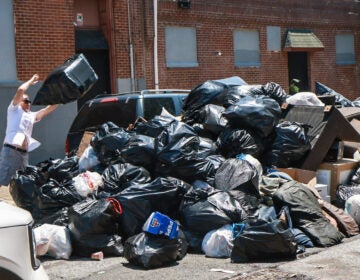 Residents continued to heap train bags