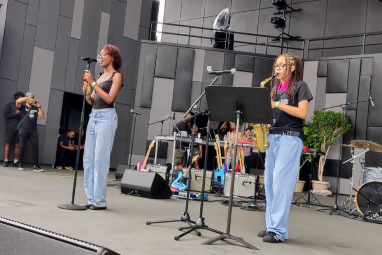 Two student performers onstage at Philly Youth Music Fest 2025