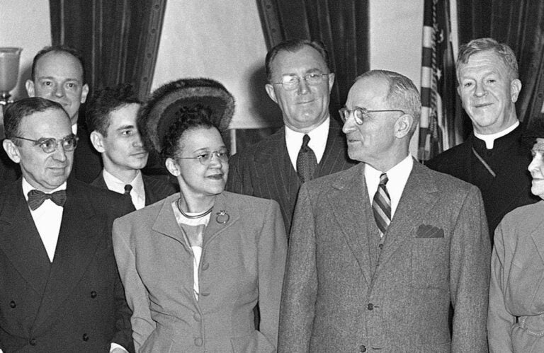Sadie Alexander stands alongside President Harry Truman and others