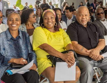 Lettie Draine, Lisa Walker and Howard Stanley smile