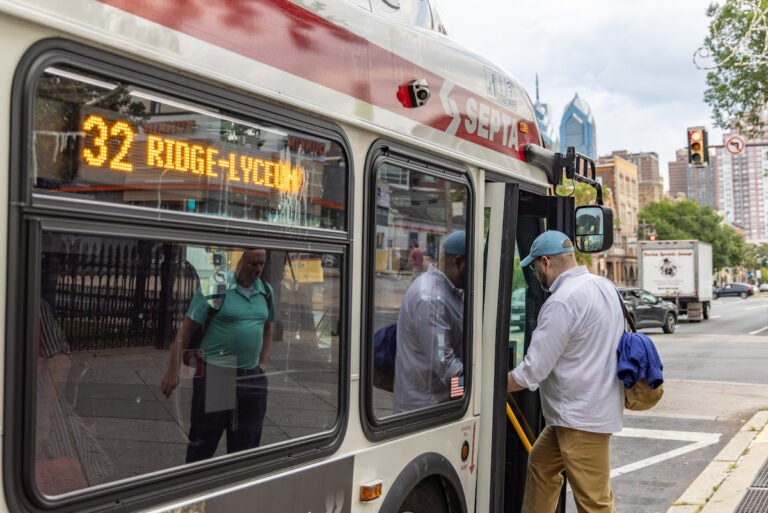 Giulio Sorgini boards the 32 bus at Broad and Christian Streets