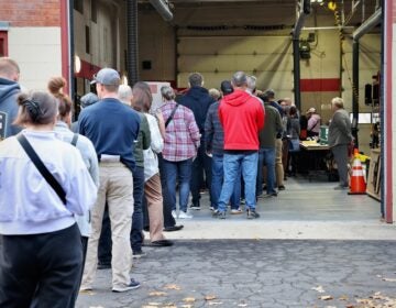 A line stretches out of the firehouse on Main Street in Moorestown Township, New Jersey