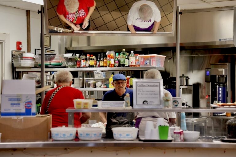 Volunteers prepare lunches in the Lutheran Settlement House