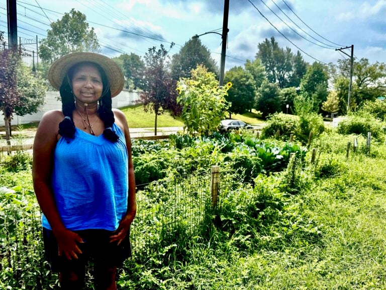 Estelle Vaughn posing for a photo in the garden