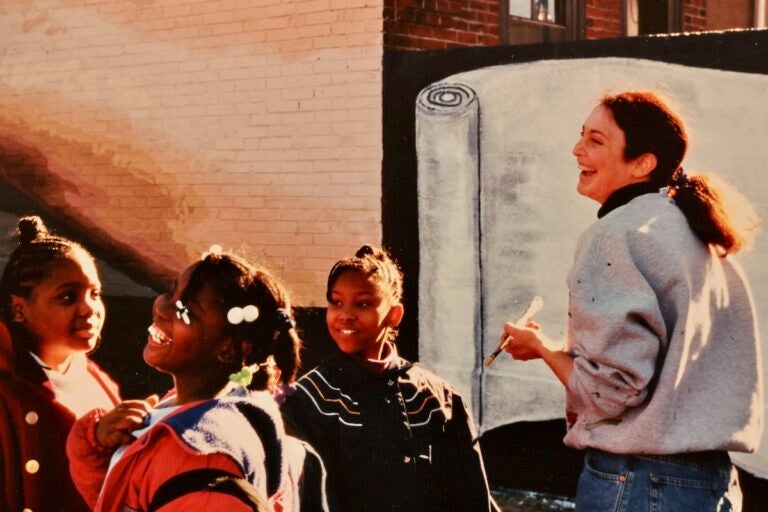 Jane Golden works on ''The Peace Wall''