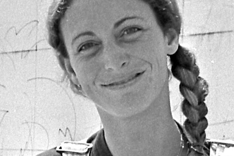 Jane Golden poses in front of mural in Santa Monica in 1981