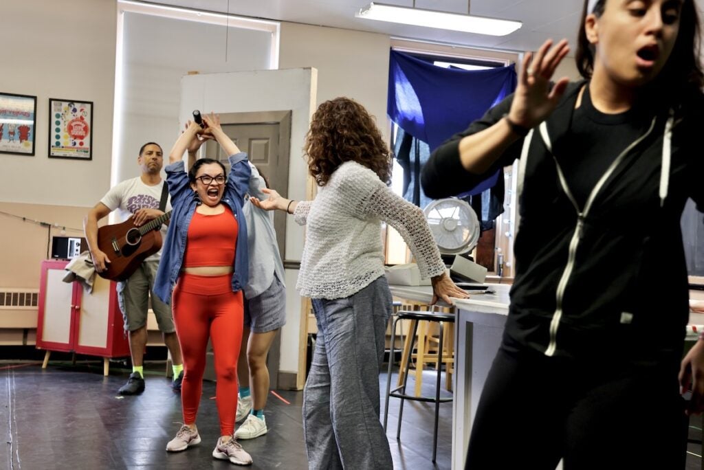 Performers rehearsing for play ''La Otra''