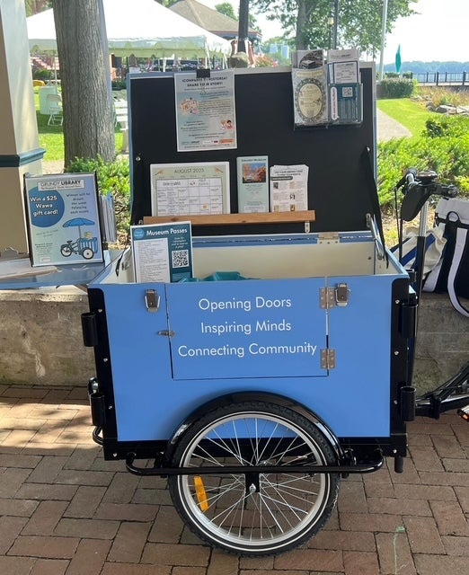 The book bike on display with a variety of pamphlets displayed