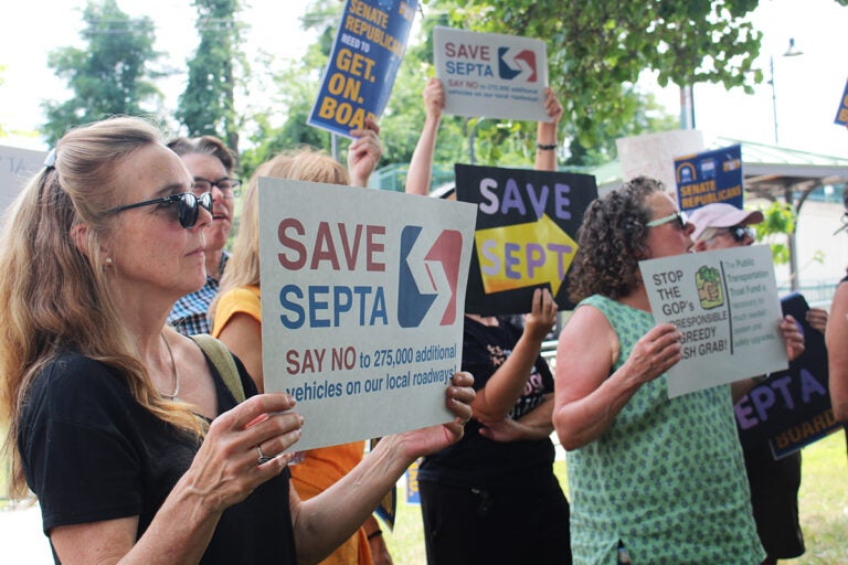 bucks-county-septa-rally-2025-08-14-5 Bucks County residents hold signs at a SEPTA funding rally