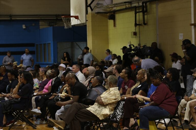 People sitting and standing in Christy Rec Center