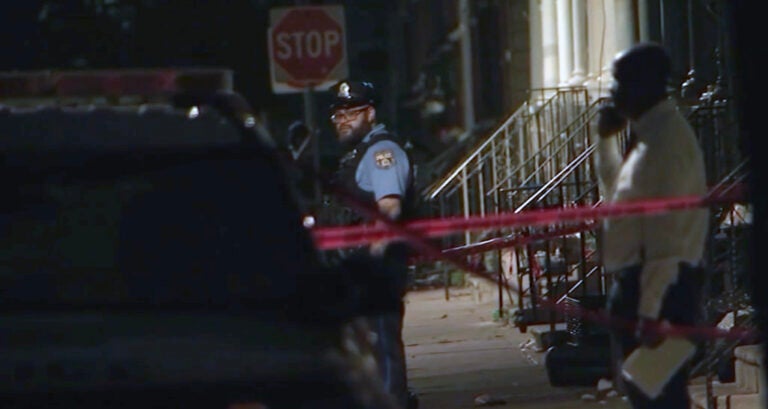 Police investigate a shooting scene in Philadelphia