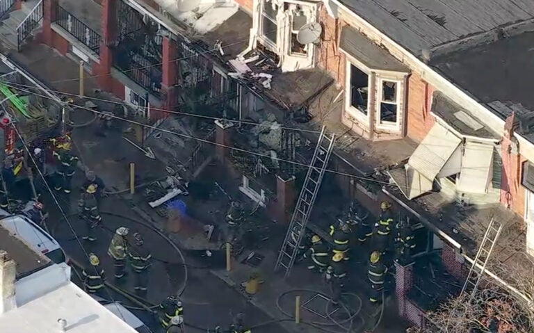 kensington-rowhomes-fire-2025-08-11-6abc an aerial view of at least five Kensington homes damaged by a fire
