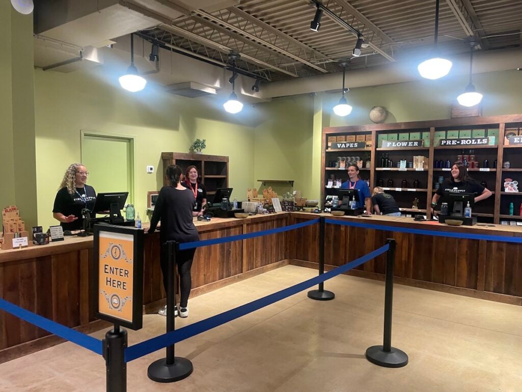 The clerks at Field Supply's cash register