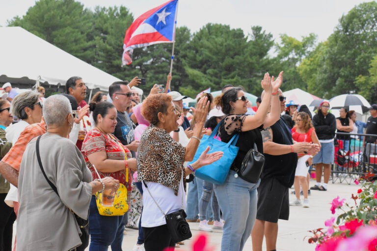 mercer_county_fiesta_latina_08162025 People cheer in a crowd at Mercer County's Fiesta Latina