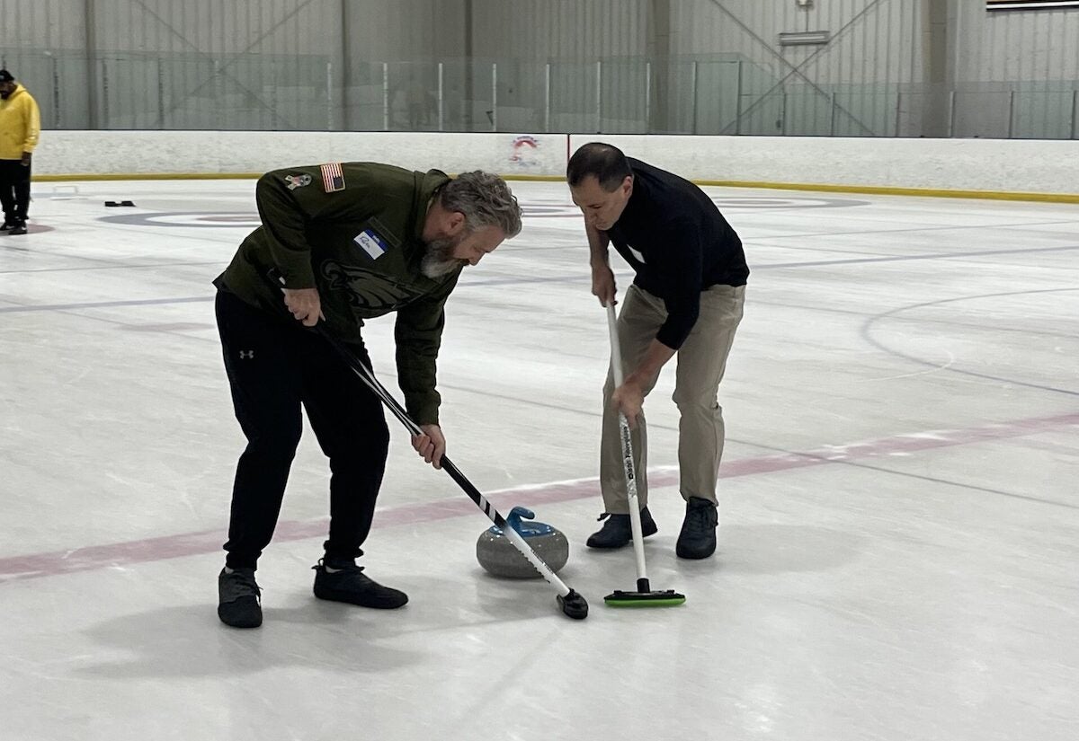 olympic-sport-curling-DM-081525-02 Beginner Curling players practicing