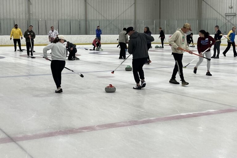 Curling players at practice