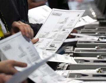 Election workers counting up ballots