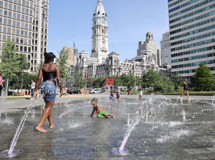 Children cooling off in a public fountain in LOVE Park