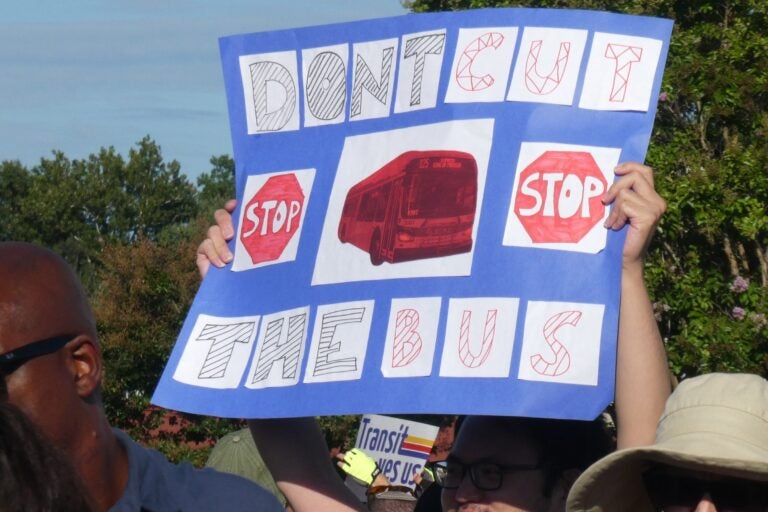 a sign reads DONT CUT THE BUS