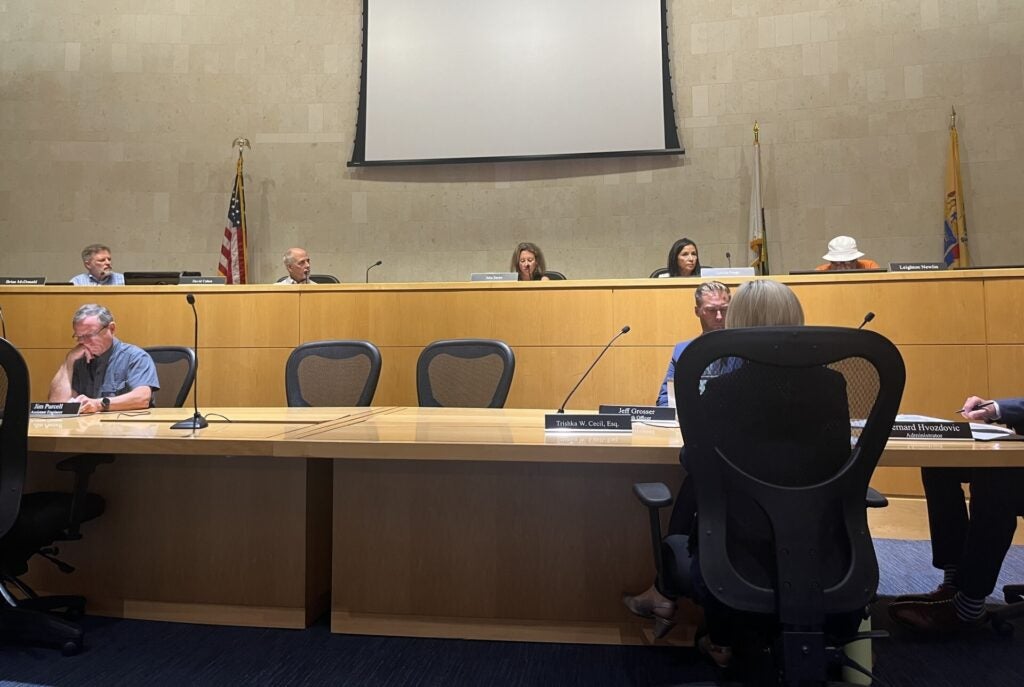 Members of Princeton's Municipal Council at their desks