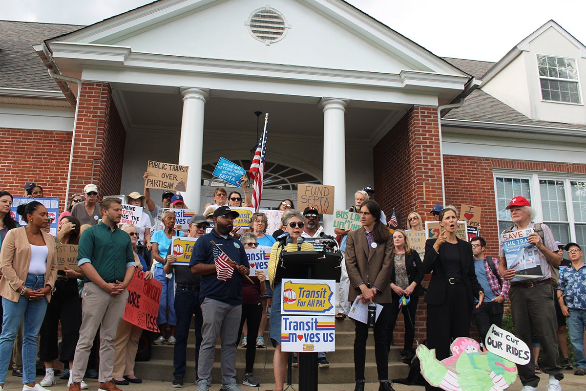 Mary Jo Daley speaks in front of SEPTA funding rallygoers