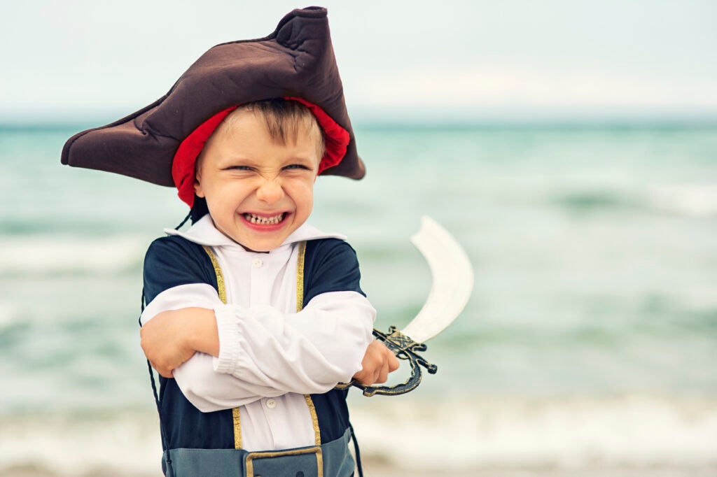 A child is dressed as a pirate