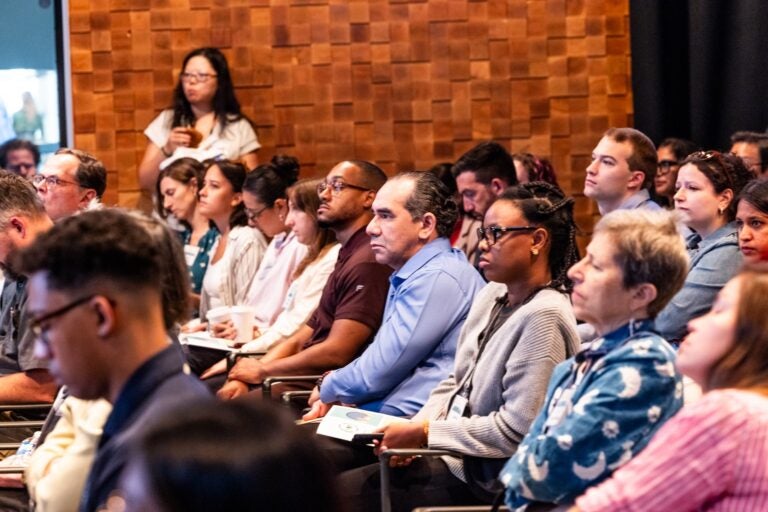 Audience members during the panel discussion